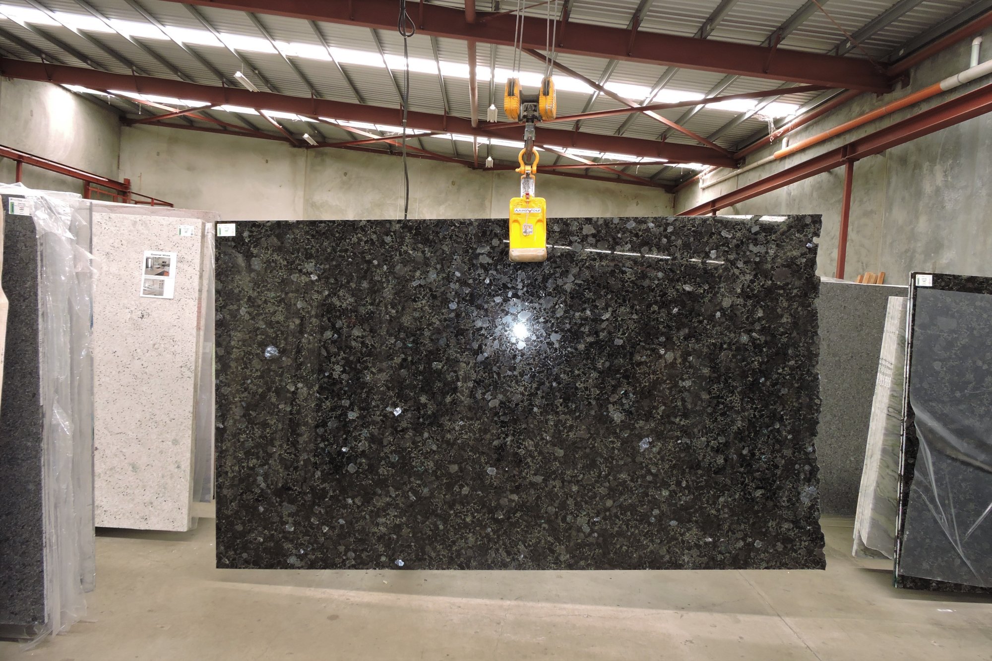 https://www.projectstone.com.au/wp-content/uploads/2019/07/Volga-Blue_20mm_granite_polished-finish_Batch1-3_ref2249_2.jpg